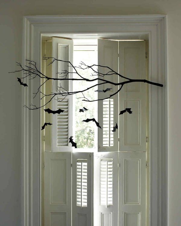 Hang some mini-bats by the window - Halloween Home Decor Ideas