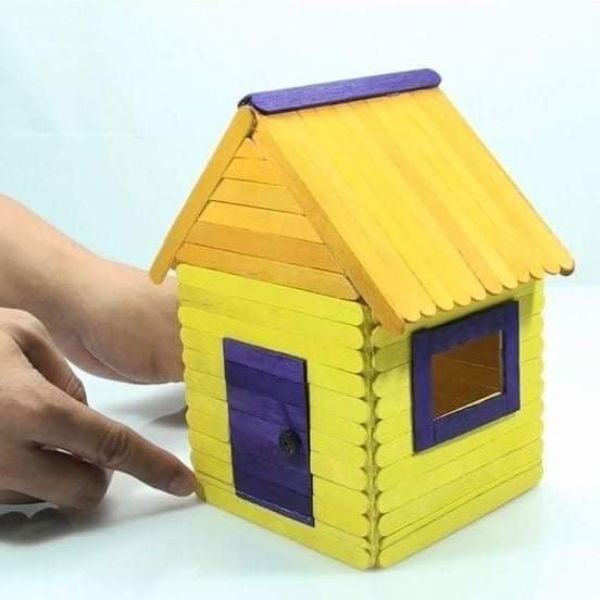  Assemble a model residence using Popsicle Sticks The yellow lowkey basic house