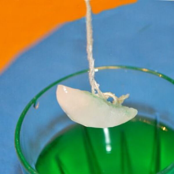 Ice cube lifting with string Easy Magic Trick Ideas for Kids