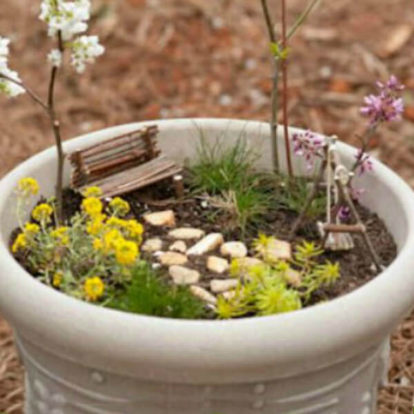 Play With Dirt Ideas For Kids Making a Spring Garden with Mud