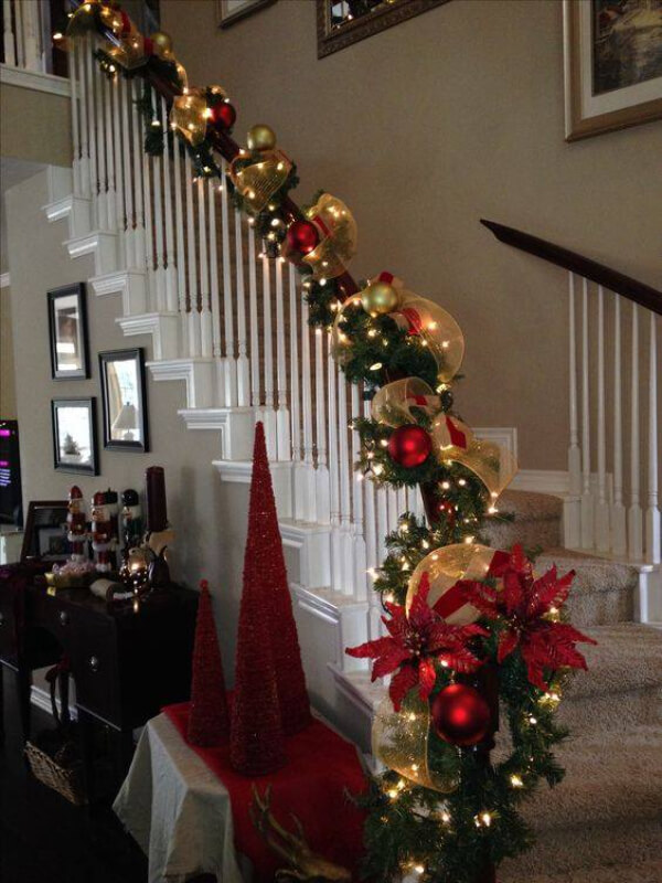 Staircase Decoration with Shiny cloth, balls, flowers, and leaves for Christmas