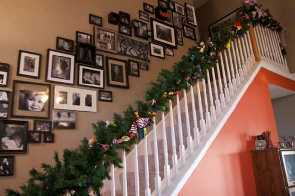 Staircase Decoration with candies and leaves for Christmas