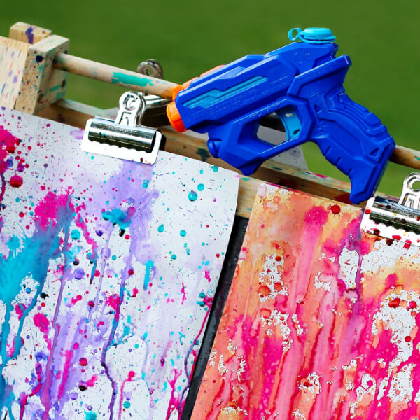 Colorful Squirt Gun Painting Outdoor Activity Idea For Kids DIY Outdoor Activities For Kids