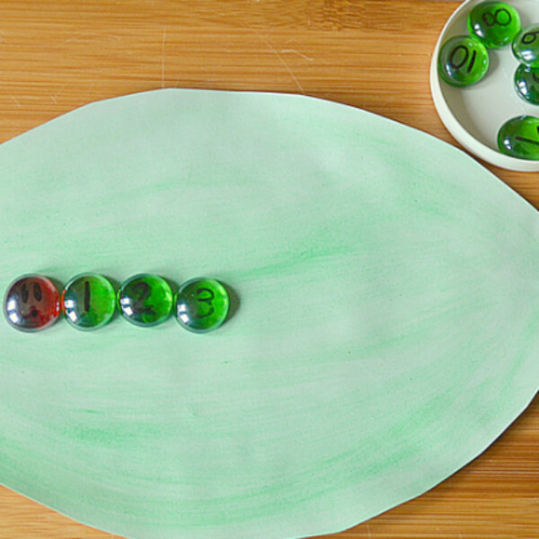 Hungry Caterpillar Maths Game Using Glass Pebbles 