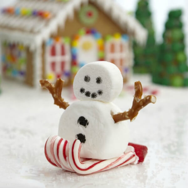 Sledding Small Snowman Craft Using Marshmallow