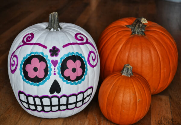 Scary Skull-Faced Painting On Pumpkins For Halloween