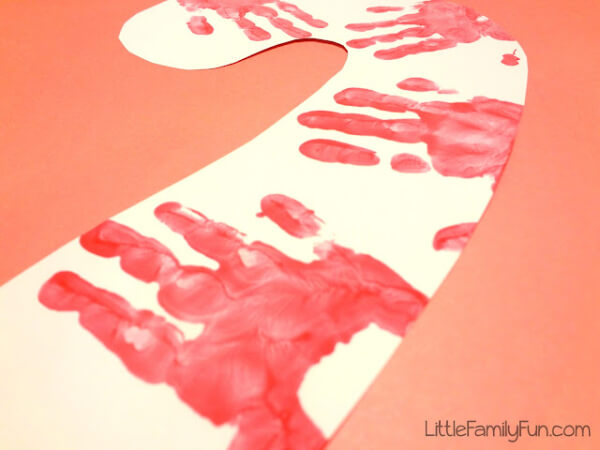 Christmas Candy Cane Craft Made Using Handprints