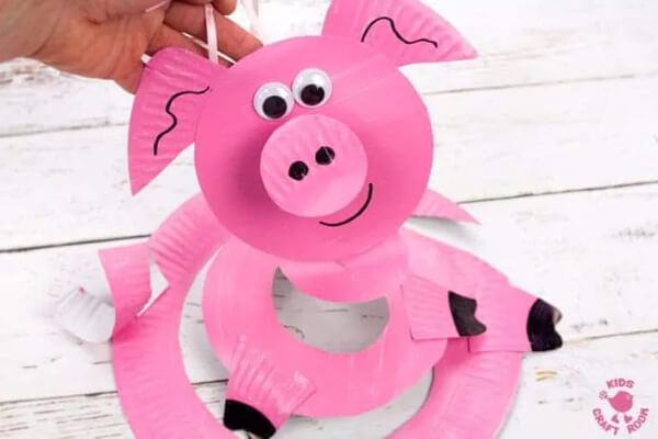 Paper Plate Pig Twirler Craft Tutorial For Kids