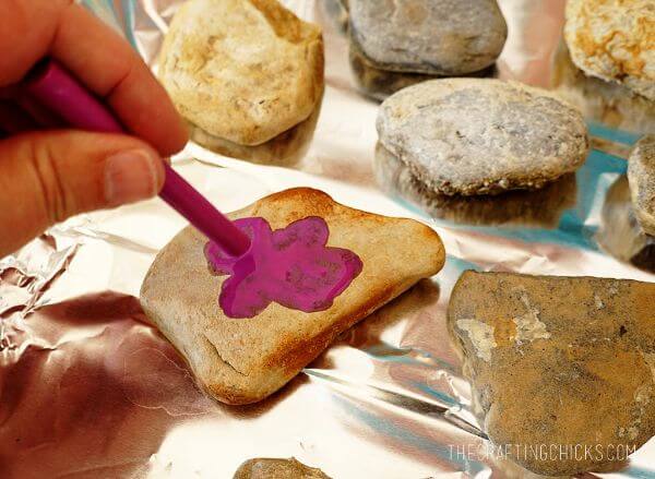 Painting On Rocks With Crayon Creative Activities With Crayons For Kids