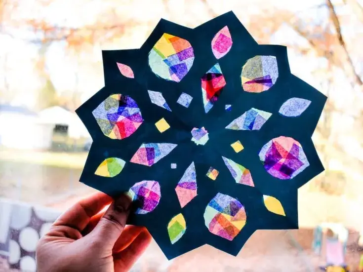 DIY Tissue Paper Snowflake Suncatcher Craft For Kids