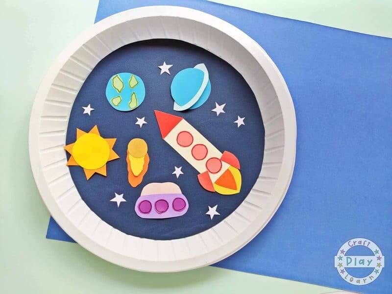 Creative Space Day paper plate Craft With Planets And Rocket For Preschoolers
