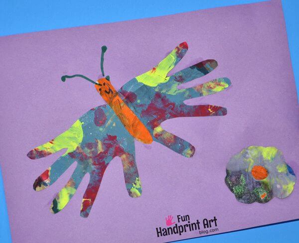 Handprint Newspaper Art & Craft Idea For Preschoolers