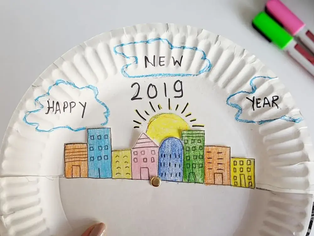 Interactive New Year's Eve Rotating Paper Plate Craft Idea For Kids