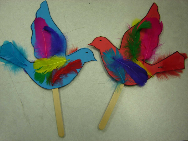 Easy Parrot-Themed Popsicle Stick Craft With Feathers For Kids