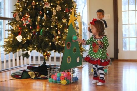 'Put The Ball In The Hole' Christmas-Themed Game Idea For Preschoolers