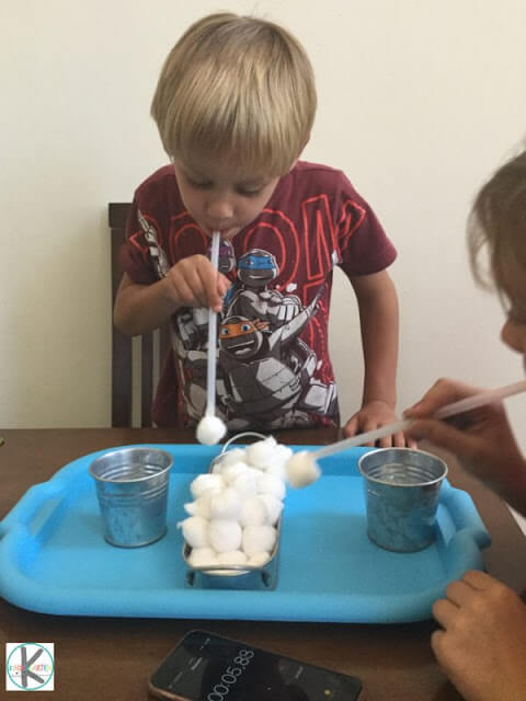 Transfer the Snowballs Indoor Christmas Game Idea For Kids