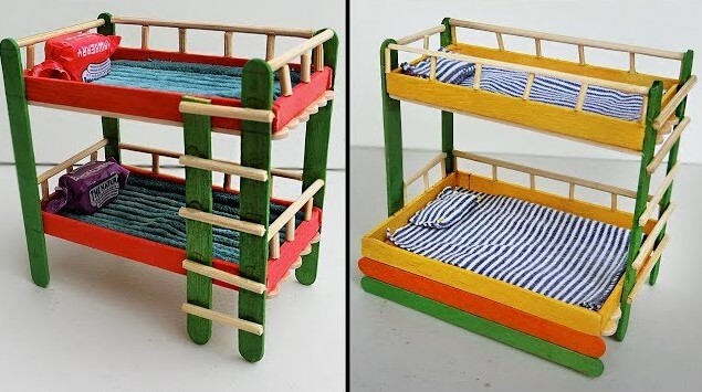Colourful miniature bunk bed made with popsicle sticks