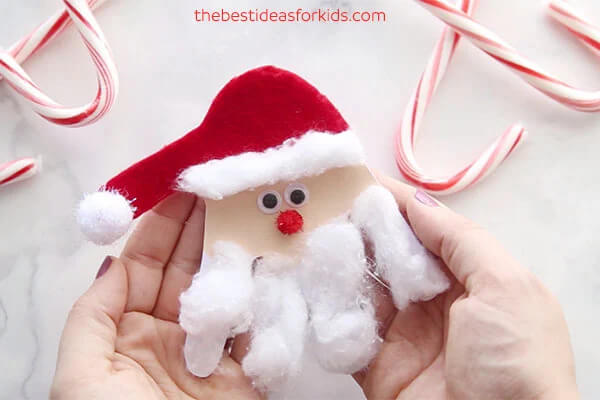 Santa Claus Handprint Shaped Craft Made With Cotton Handprint & Footprint Santa Claus Craft Ideas For Kids