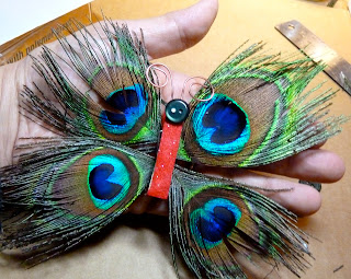 Easy & Quick Butterfly Ornament Craft With Peacock Feathers Peacock feather craft ideas