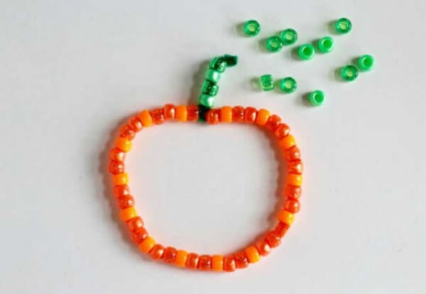 Easy To Make Pony Beaded Pumpkin Craft With Pipe Cleaners For Kids
