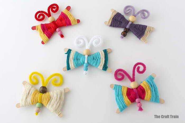 Easy-To-Make Popsicle Yarn Butterfly Craft Idea Cute easy things to make with yarn