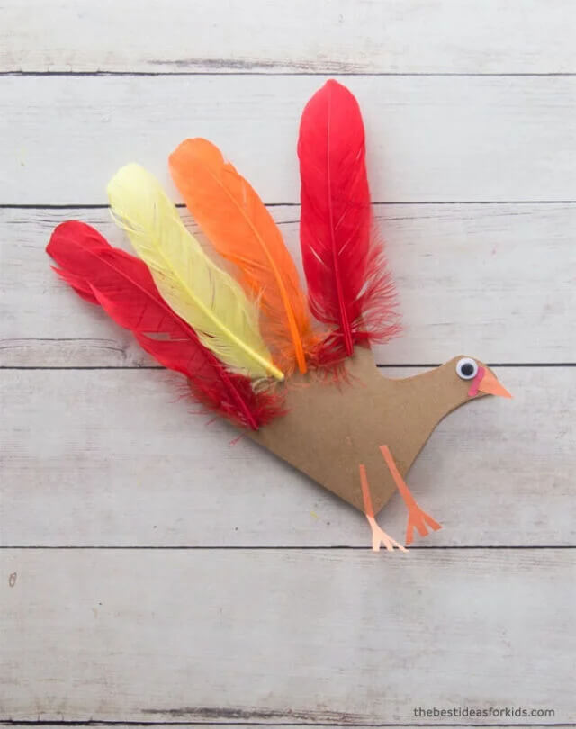 Handprint Turkey Gift Card Craft For Kids Using Feathers Turkey feather craft ideas