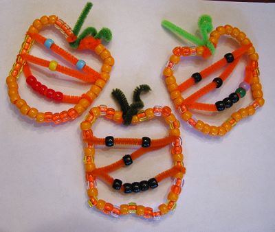 Jack-o-lantern Pumpkin Ornaments Pony Bead Craft Using Pipe Cleaners For Preschoolers