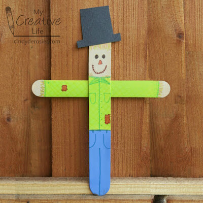 Very Simple And Fun Popsicle Sticks Scarecrow Craft For Kids Popsicle Stick Scarecrow Crafts For Kids