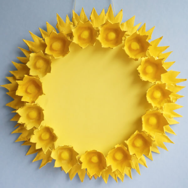 Adorning Yellow Colored Flower Wreath Idea For Wall DecorEgg Tray Wall Hanging Crafts