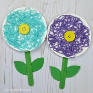 Beautiful Yarn Flower Made With Paper Plate, Craft Sticks & ButtonsButton crafts with paper plate