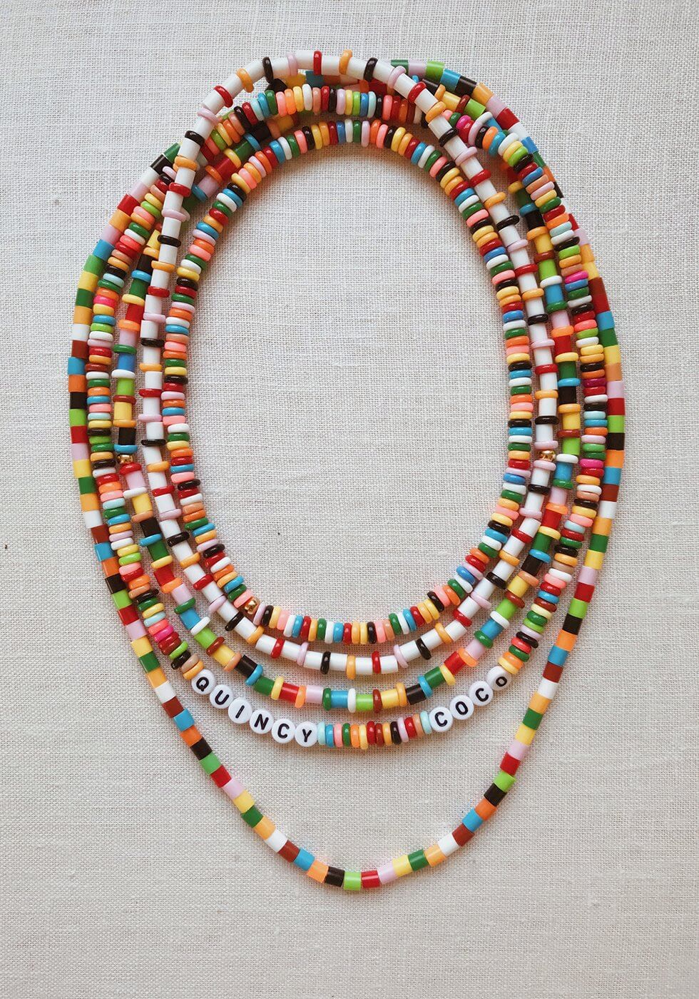 Gorgeous Perler Bead Jewelry Craft Using Letter Beads, Crimp Covers & Parchment Paper