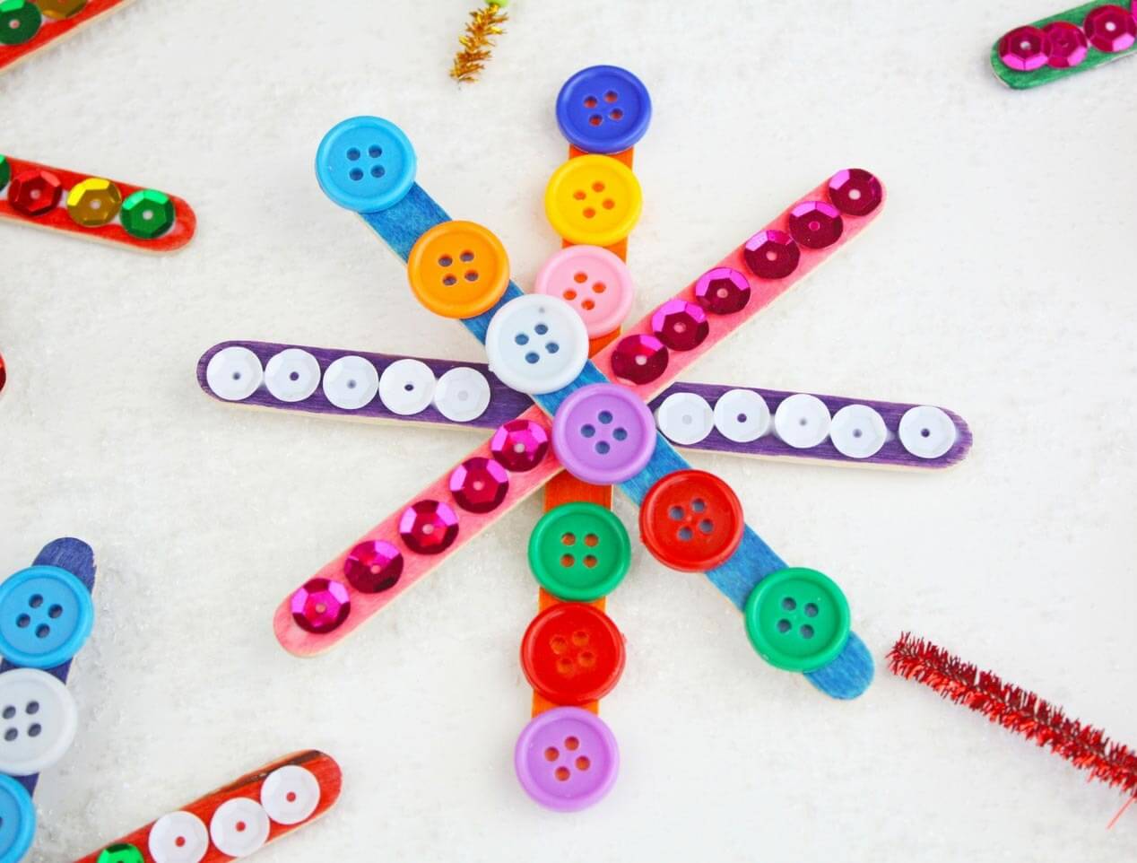 Pretty Snowflake Decoration Craft With Buttons, Popsicle Sticks & Beads Snowflake Button Craft Using popsicle stick