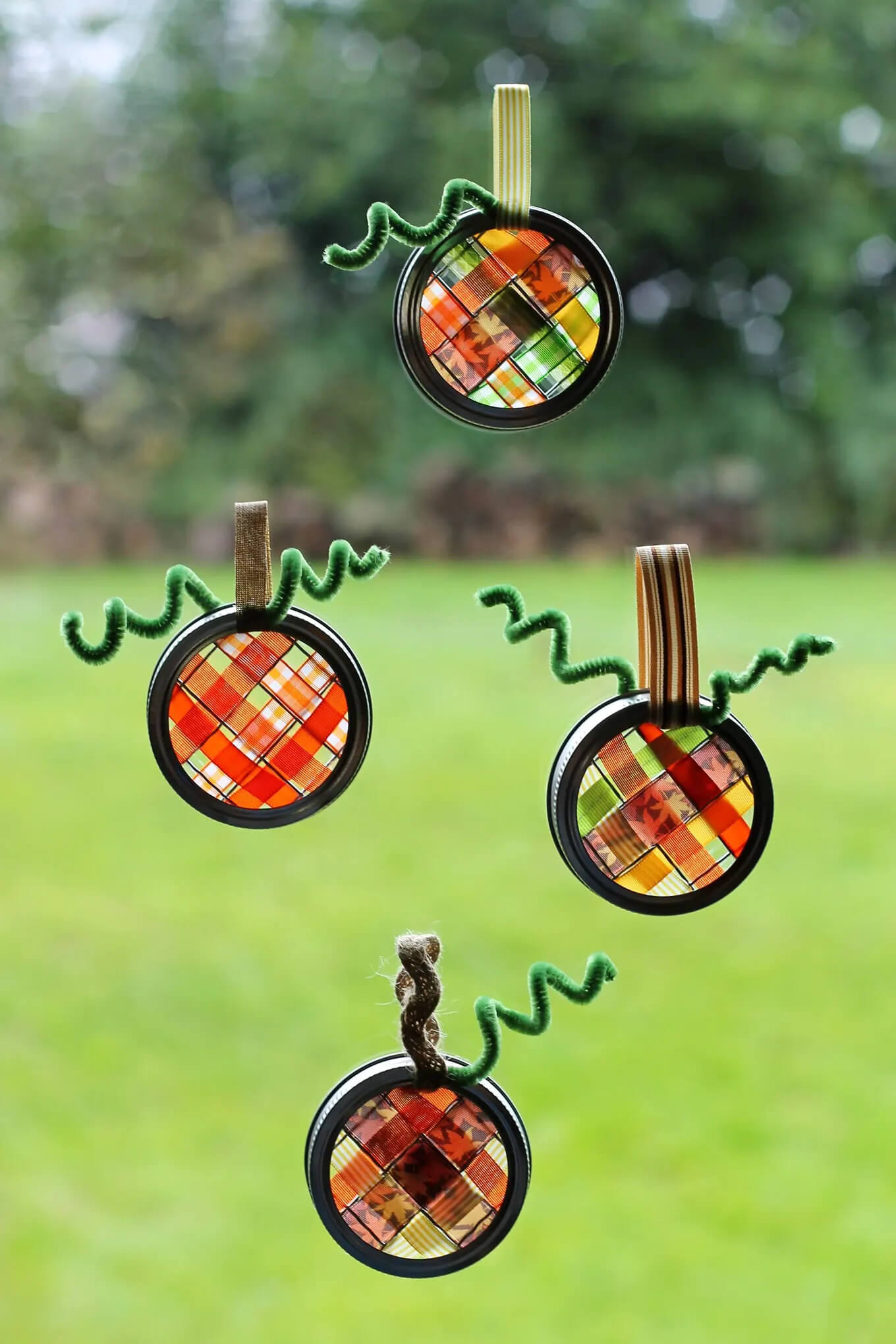  Pumpkin Themed Mason Jar Lid Suncatchers With Scrap Ribbon Mason Jar Lid Suncatcher Crafts