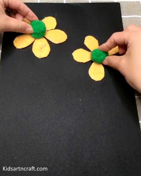 A Beautiful To Make Adorable Orange Peel Flower Craft Using Pom Pom