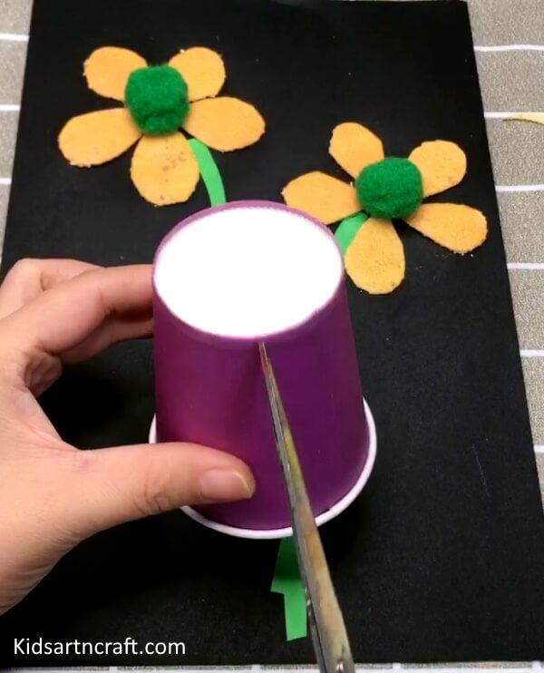 A Lovely Orange Peel Flower Craft Idea For Kids Using Paper Cup