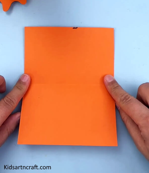 Take a Rectangular Orange Sheet - Making a paper chicken craft can be an enjoyable pursuit. 