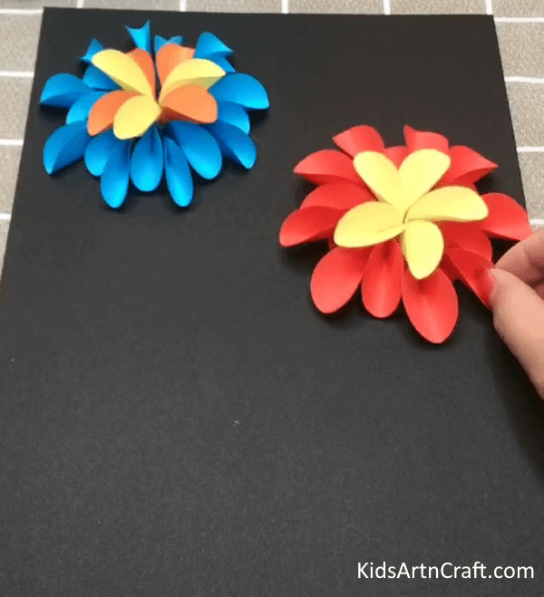 A Construction Paper Is Used To Make Beautiful Flower Craft At Home