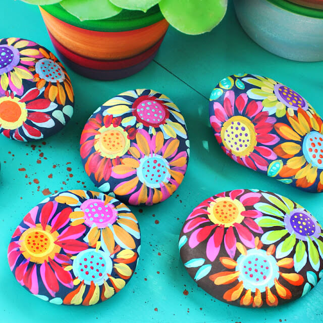 Adorable Painting Flowers on River rocks