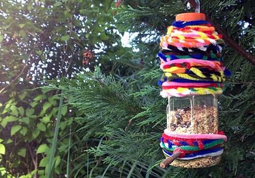 Bird Feeder Decoration Craft Idea With Recycled Plastic Bottle & Pipe Cleaners