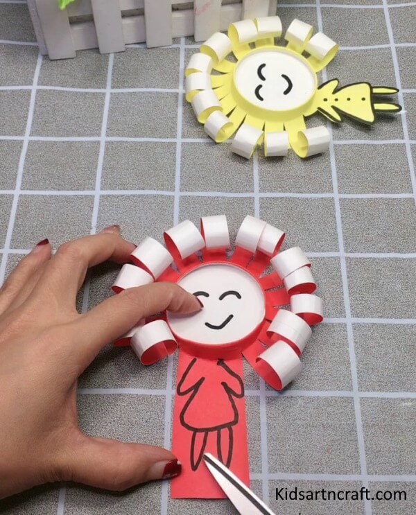 Cutting out the extra Paper From Cup to make the Doll's Body- Step By Step Toy Making Tutorial