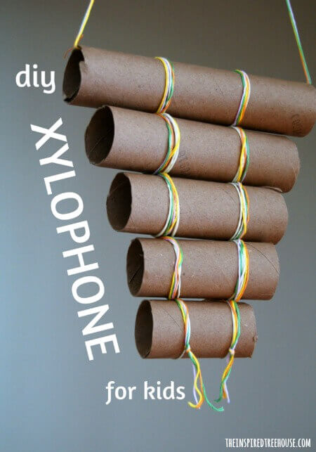 Homemade Xylophone Instrument Craft With Paper Towel Rolls & Ribbons