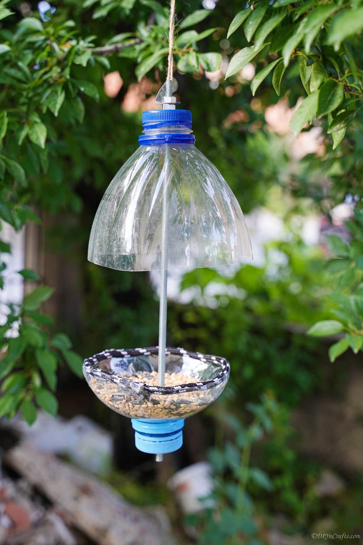 Repurposed Plastic Bottle Bird Feeders Craft Tutorial With Step-by-step Instructions