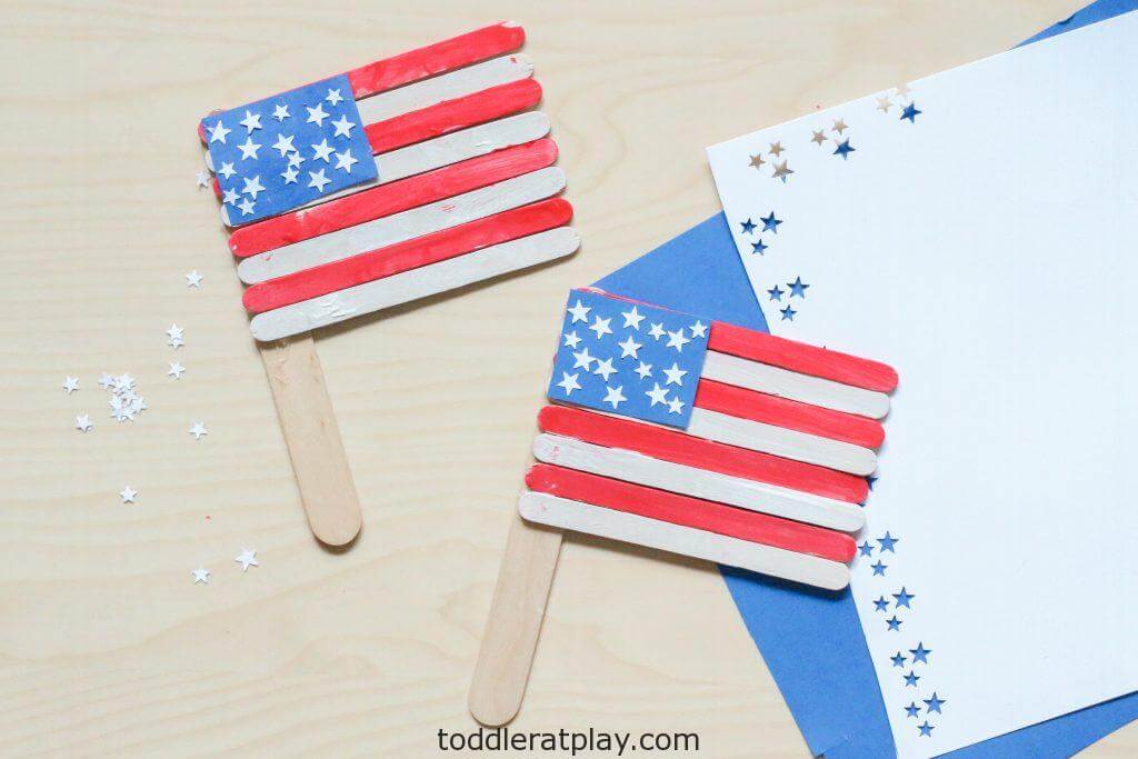 Simple Popsicle Sticks American Flag Craft For Patriotic Day - An uncomplicated guide to constructing a flag with Popsicle sticks.