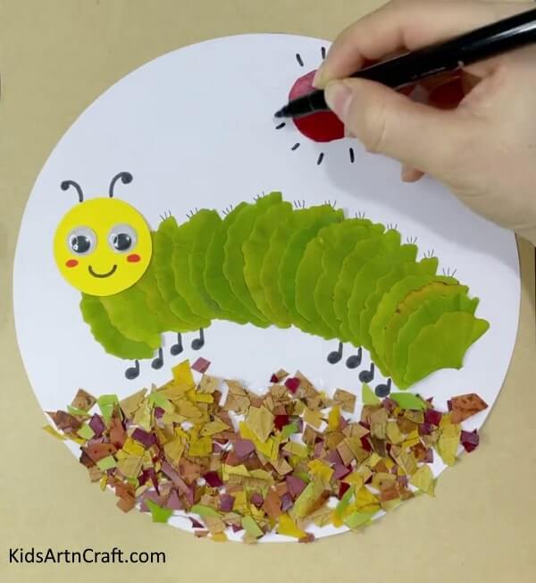 Assemble a lovely caterpillar and sun craft with leaves, paper, and googly eyes - Lovely Caterpillar And Sun Craft With Leaves