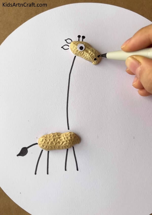 Crafting Giraffes with Recycled Fall Leaves and Peanut Shells - Giraffe Art and Craft