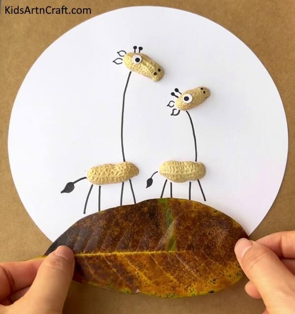 Crafting Giraffe Art with Reused Fall Leaves and Peanut Shells - Giraffe Art and Craft