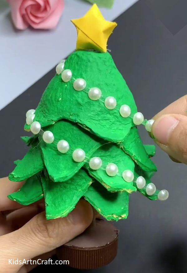 Pasting Pearls - Guide for Youngsters on Constructing a Christmas Tree with an Egg Carton