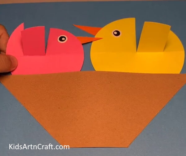 Inserting Pink Bird On Nest - Making a Nest For a Bird Using Paper