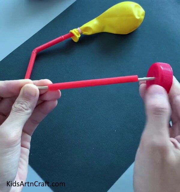Add Bottle Caps- Tutorial on How to Build a Car with a Balloon and Straw