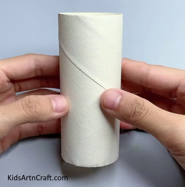 Getting a Cardboard Tube - Making a Bat Out of Recycled Cardboard Tubes - Step by Step